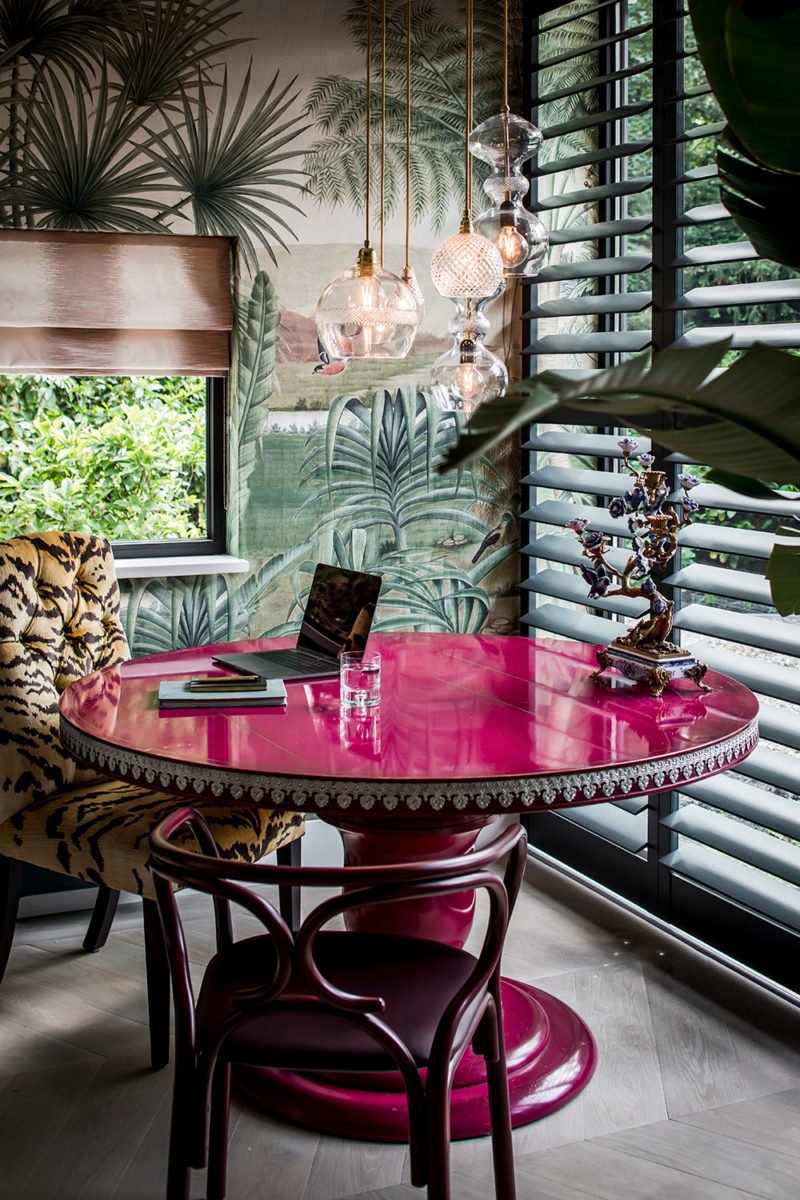 dutch interior design pink table palm wallpaper tiger chair