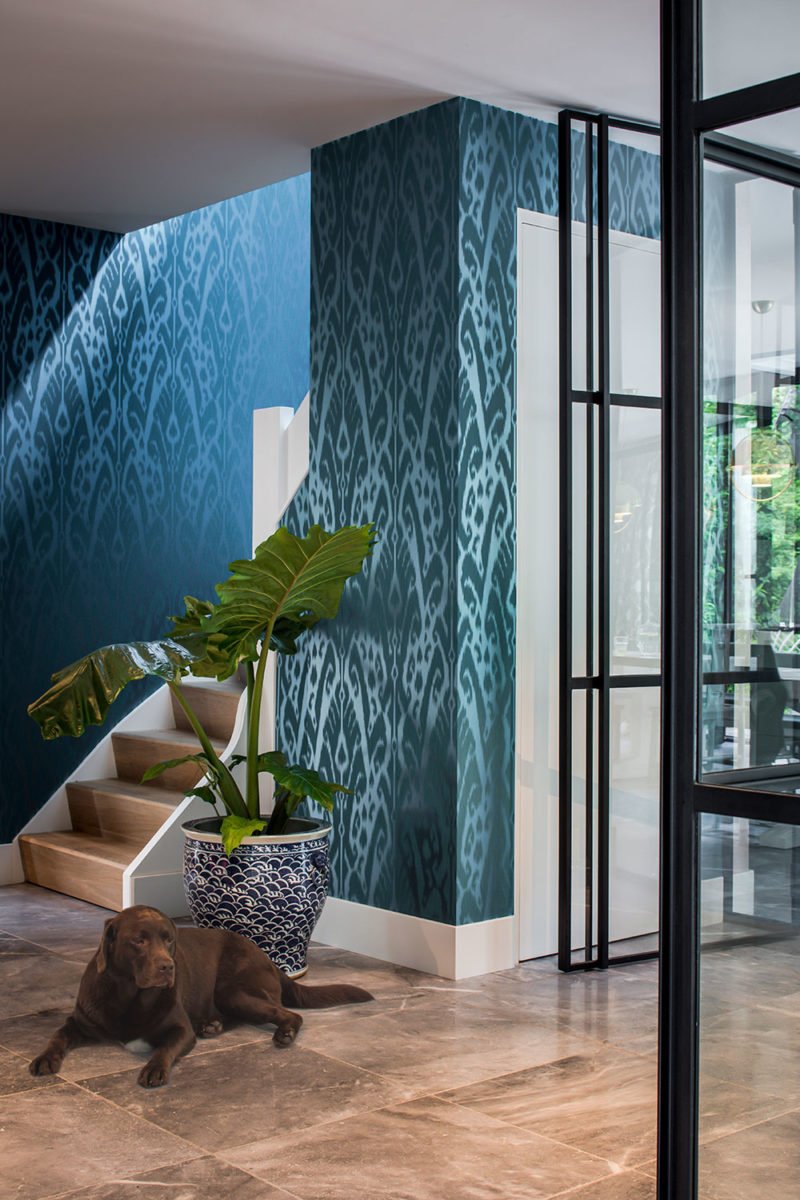 dutch interior design dog blue wallpaper ornament pattern
