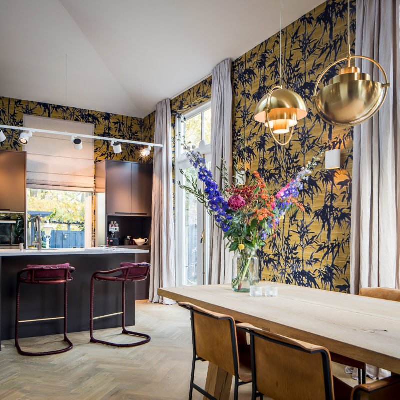 dutch interior design gold lamp dining table kitchen
